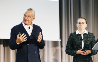 Steffen und Freya Wester-Ebbinghaus auf der Bühne des TOC Summit